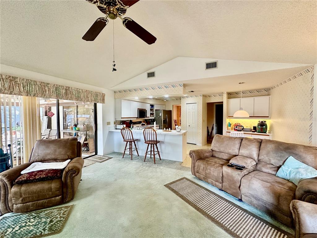 262 Santa Rosa Drive Winter Haven, FL 33884 - Photo 17 of 40 a living room with furniture and a large window