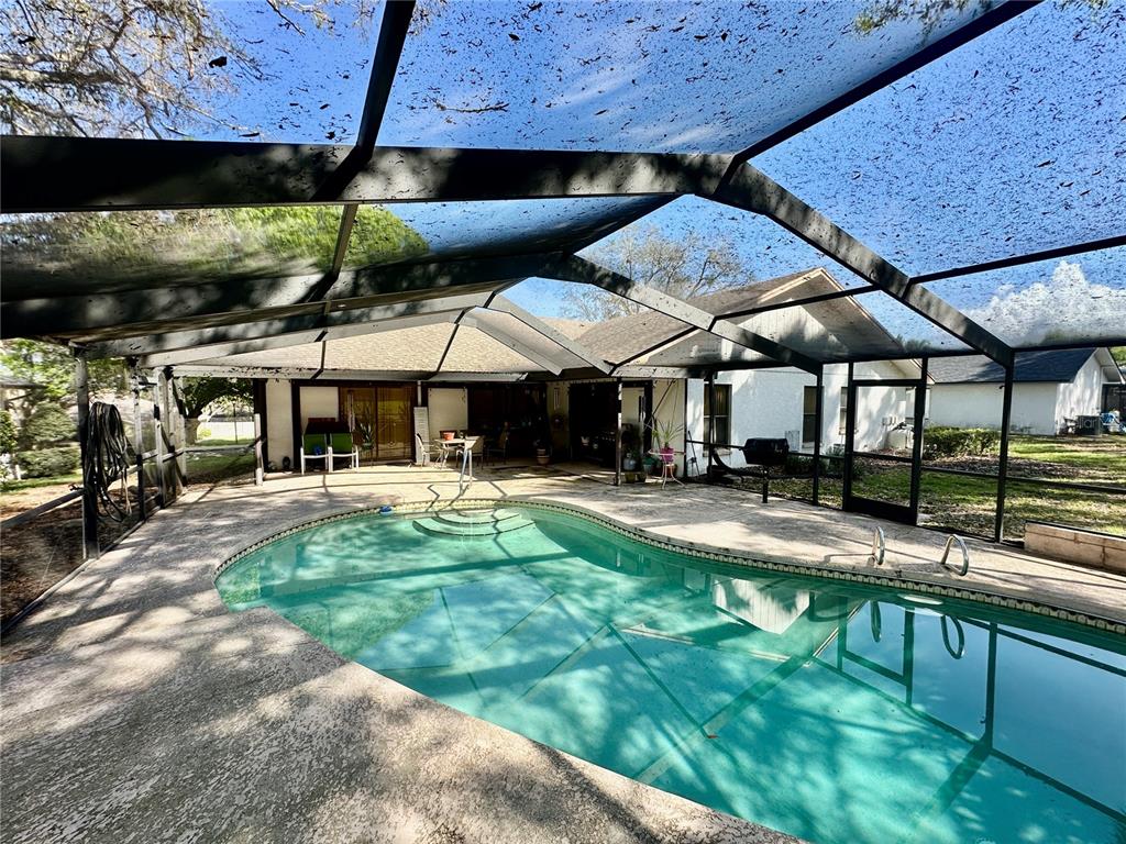 262 Santa Rosa Drive Winter Haven, FL 33884 - Photo 33 of 40 a swimming pool view with a seating space