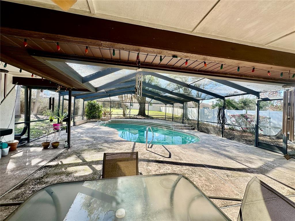 262 Santa Rosa Drive Winter Haven, FL 33884 - Photo 36 of 40 a view of a swimming pool with a patio