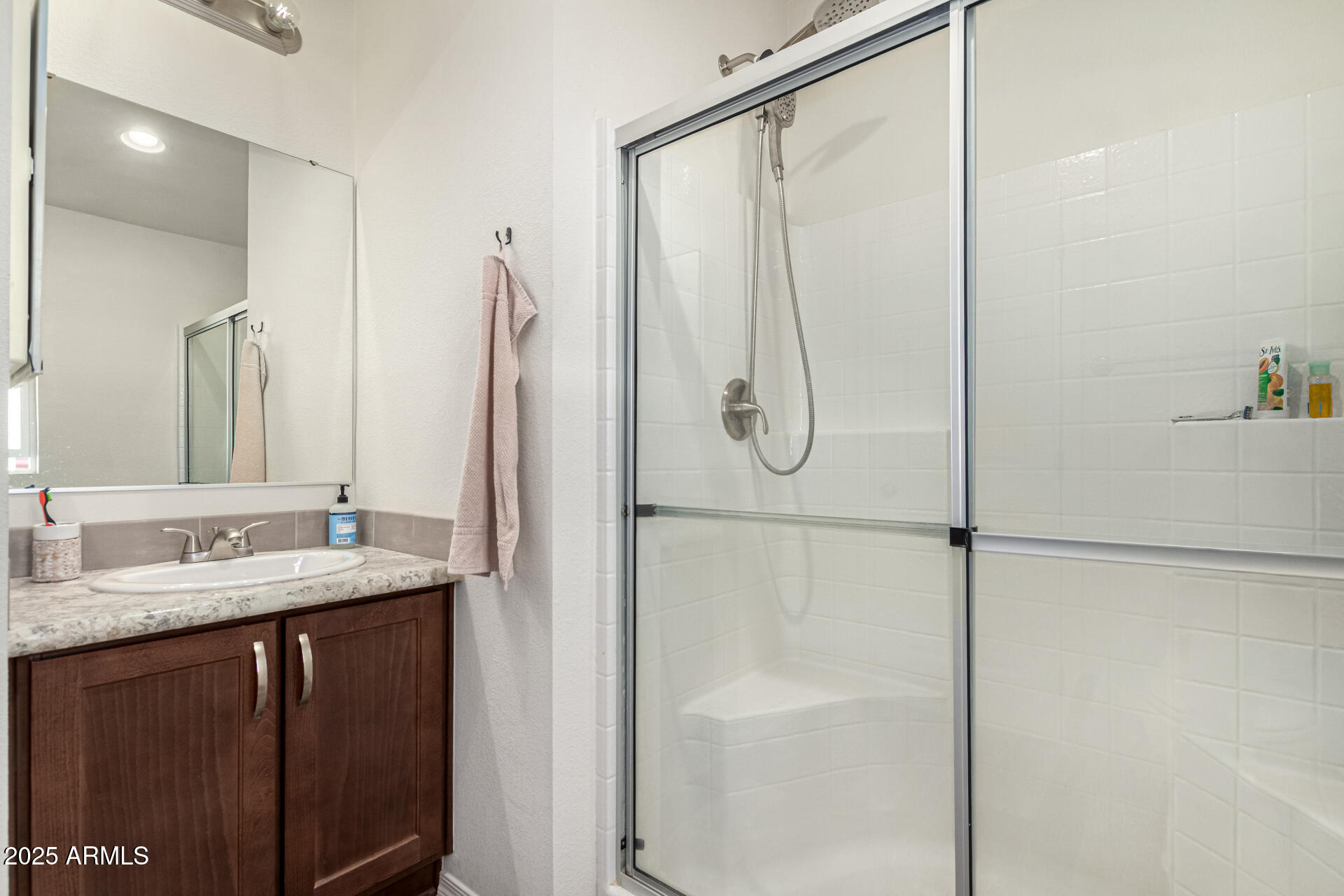 16225 North Cave Creek Road, Unit 85 Phoenix, AZ 85032 - Photo 14 of 36 a bathroom with a granite countertop shower sink vanity and mirror