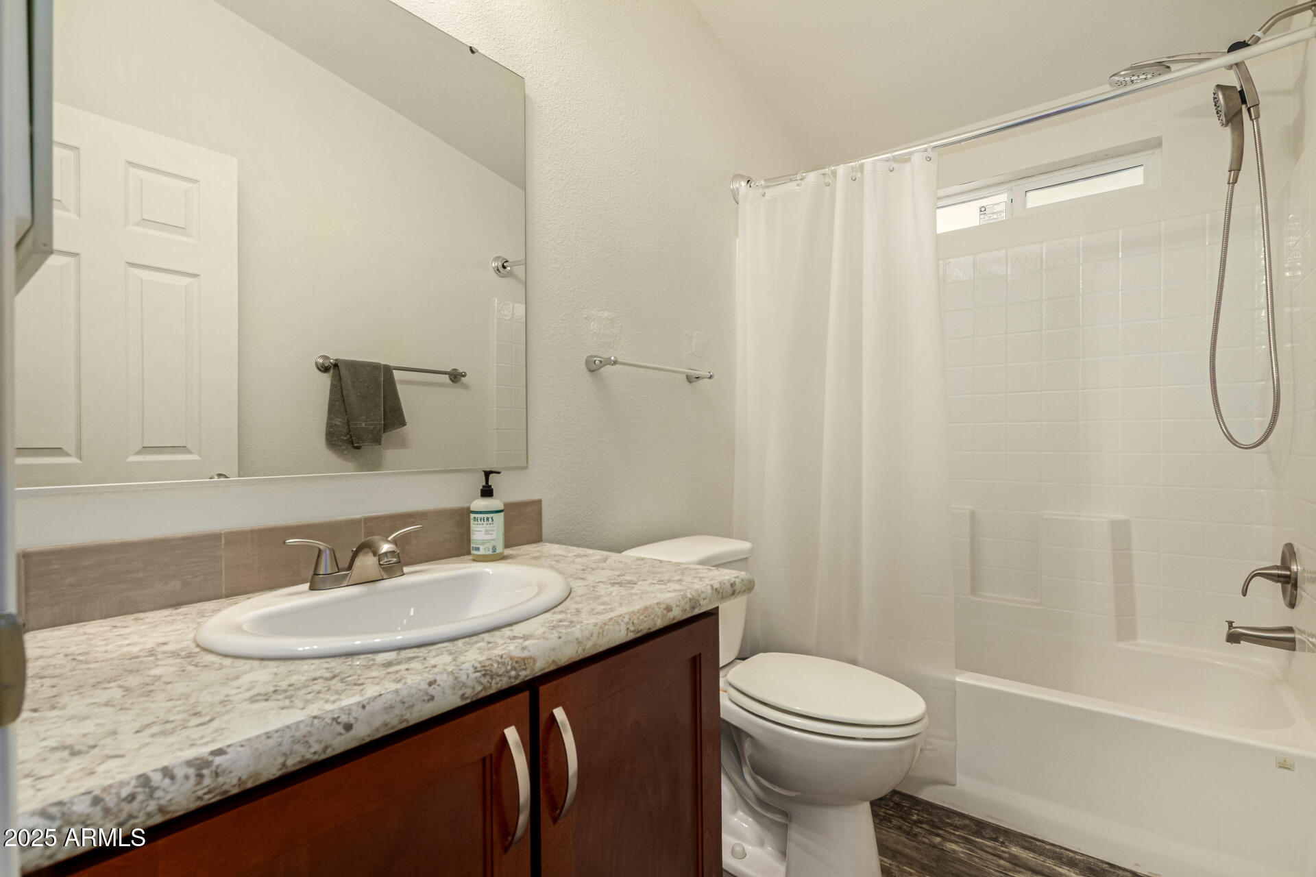 16225 North Cave Creek Road, Unit 85 Phoenix, AZ 85032 - Photo 15 of 36 a bathroom with a granite countertop sink toilet and shower