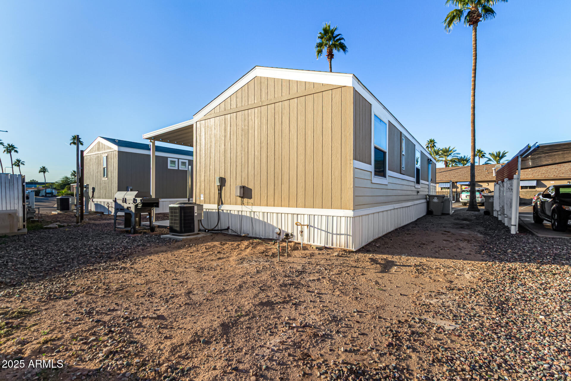 16225 North Cave Creek Road, Unit 85 Phoenix, AZ 85032 - Photo 22 of 36 a view of a house with backyard