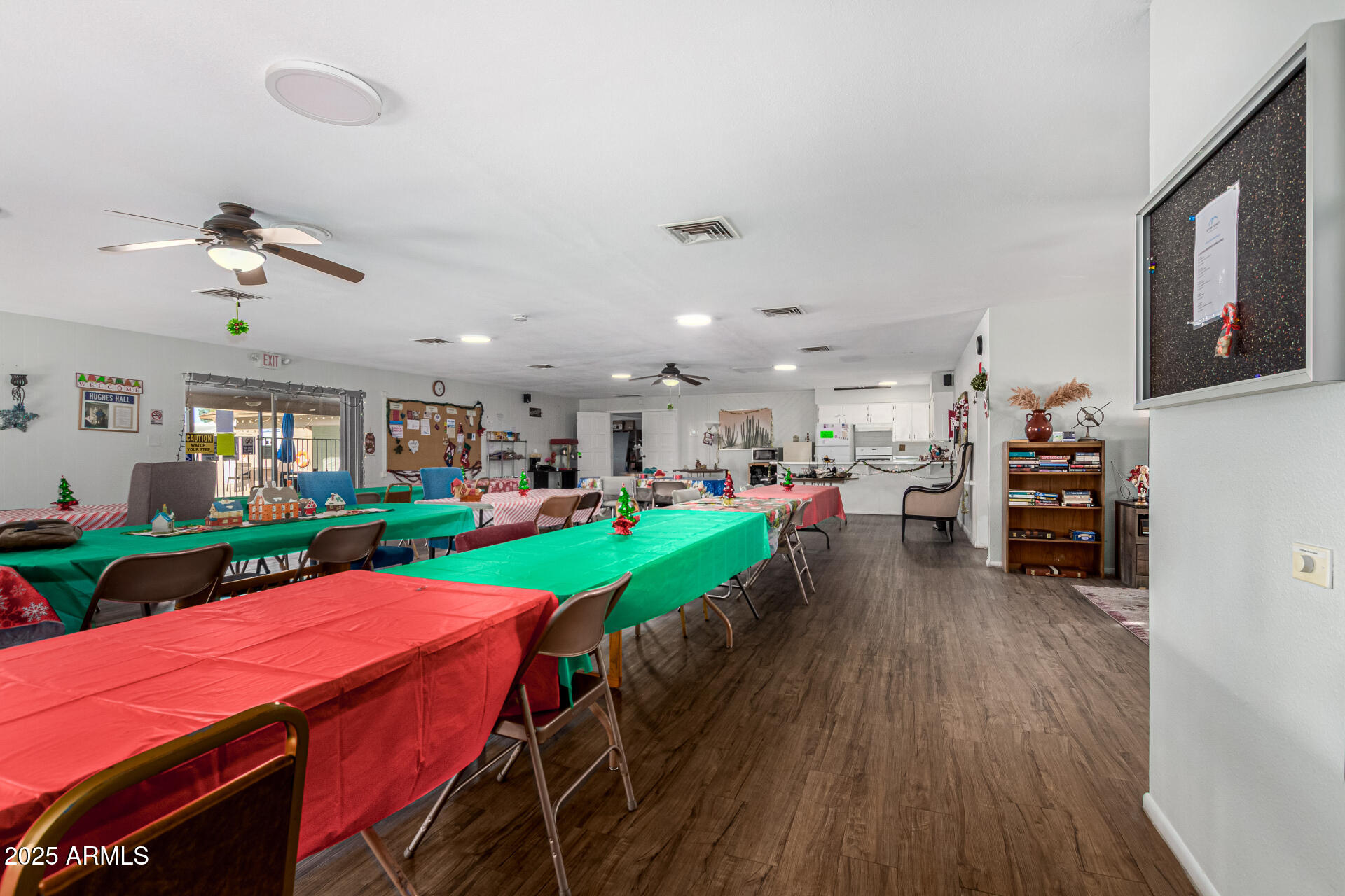 16225 North Cave Creek Road, Unit 85 Phoenix, AZ 85032 - Photo 28 of 36 a view of a dining room with furniture window and wooden floor