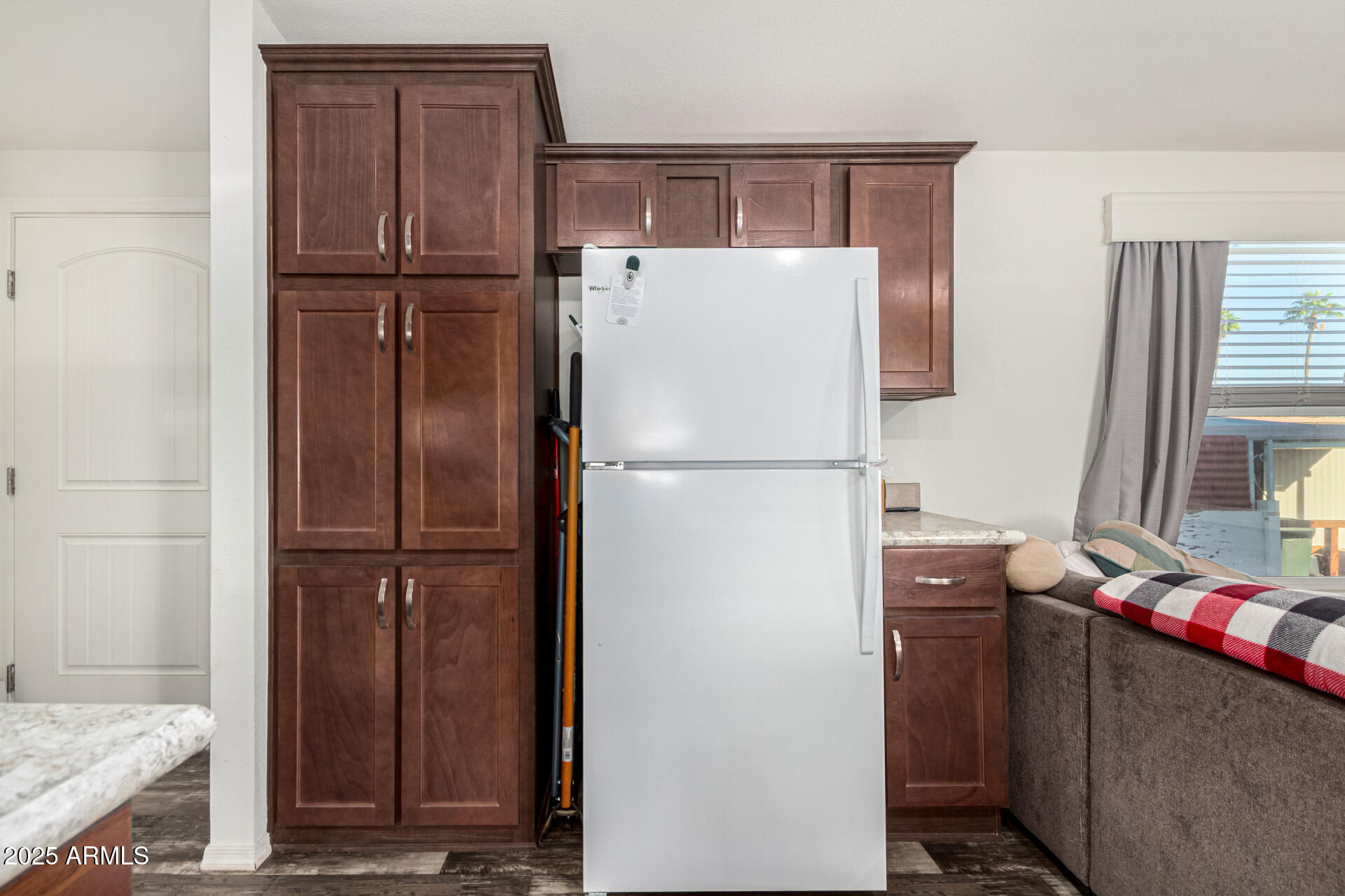 16225 North Cave Creek Road, Unit 85 Phoenix, AZ 85032 - Photo 7 of 36 a white refrigerator freezer and a stove sitting inside of a kitchen