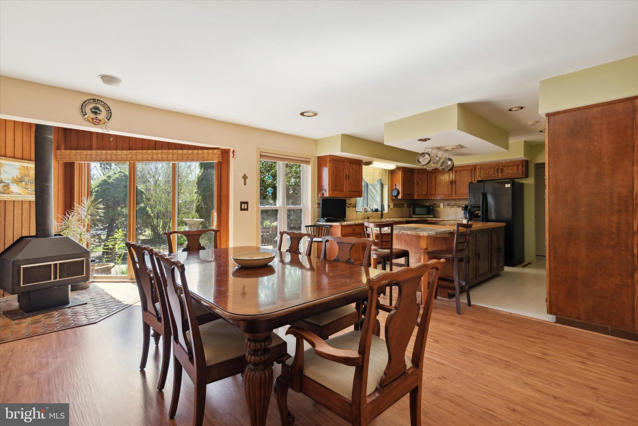 655 Lindley Road Glenside, PA 19038 - Photo 12 of 35 Wood burning stove adds warmth to kitchen.