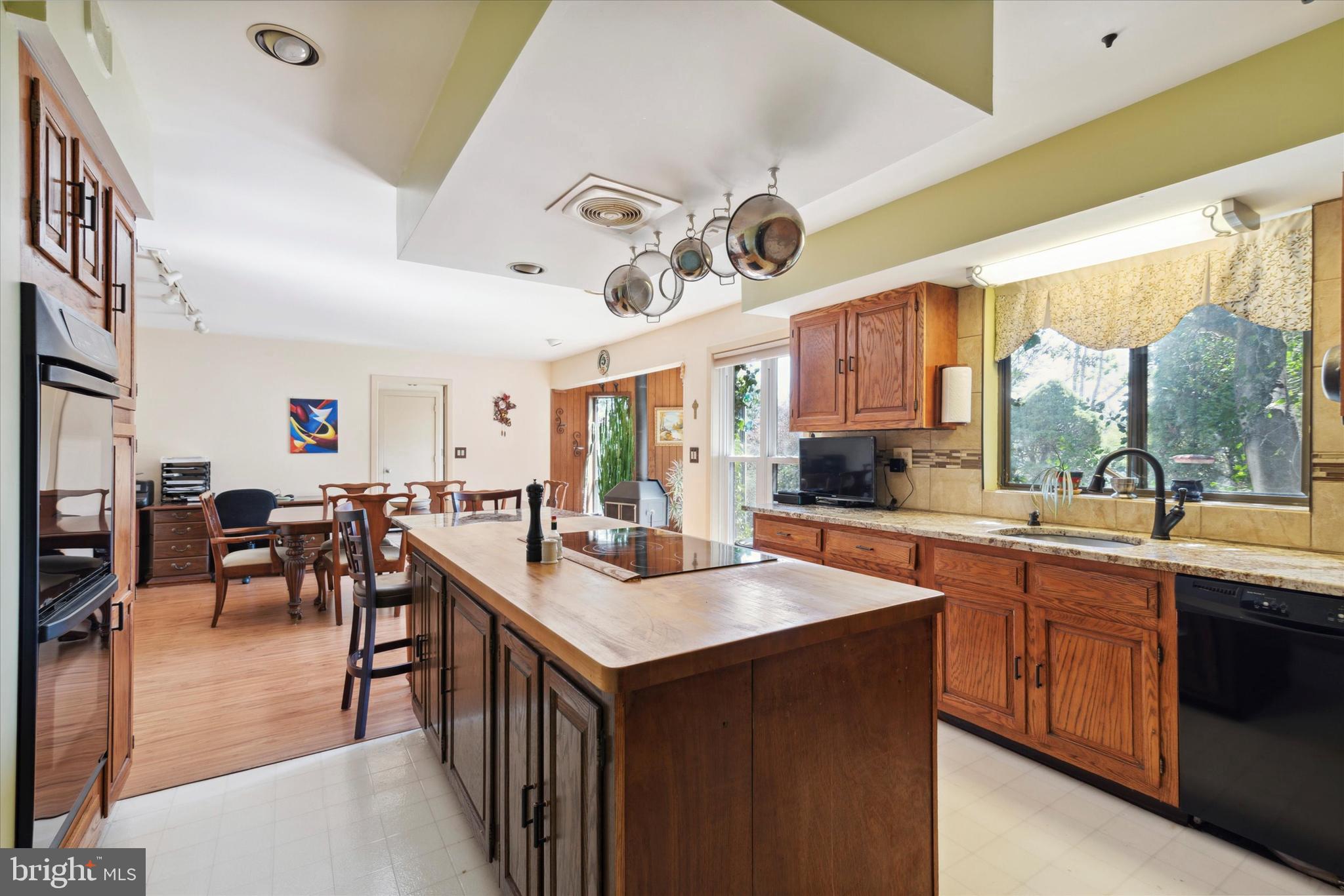 655 Lindley Road Glenside, PA 19038 - Photo 14 of 35 Kitchen island has electric cooktop.