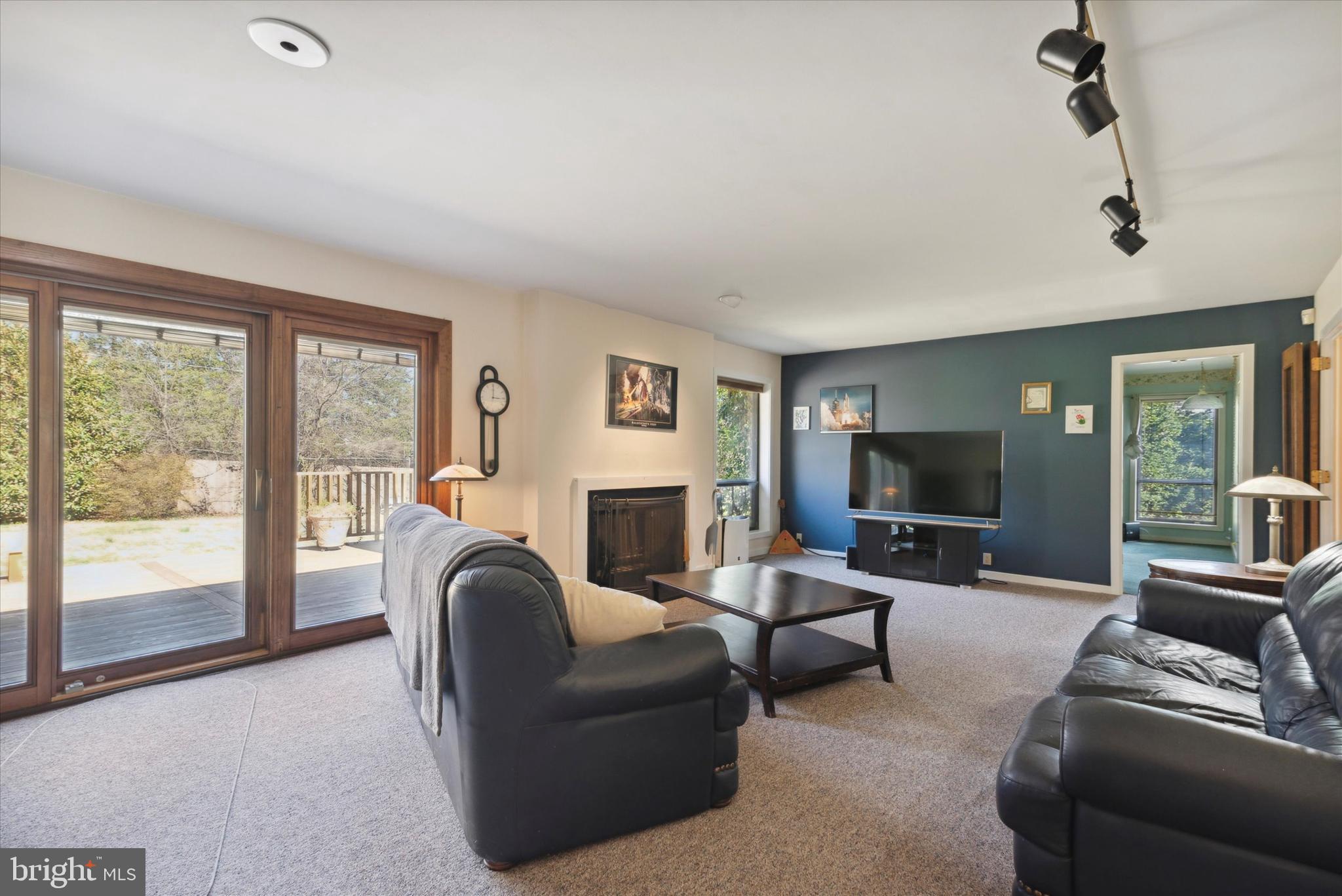 655 Lindley Road Glenside, PA 19038 - Photo 19 of 35 Sliding doors take you out to the cedar deck.