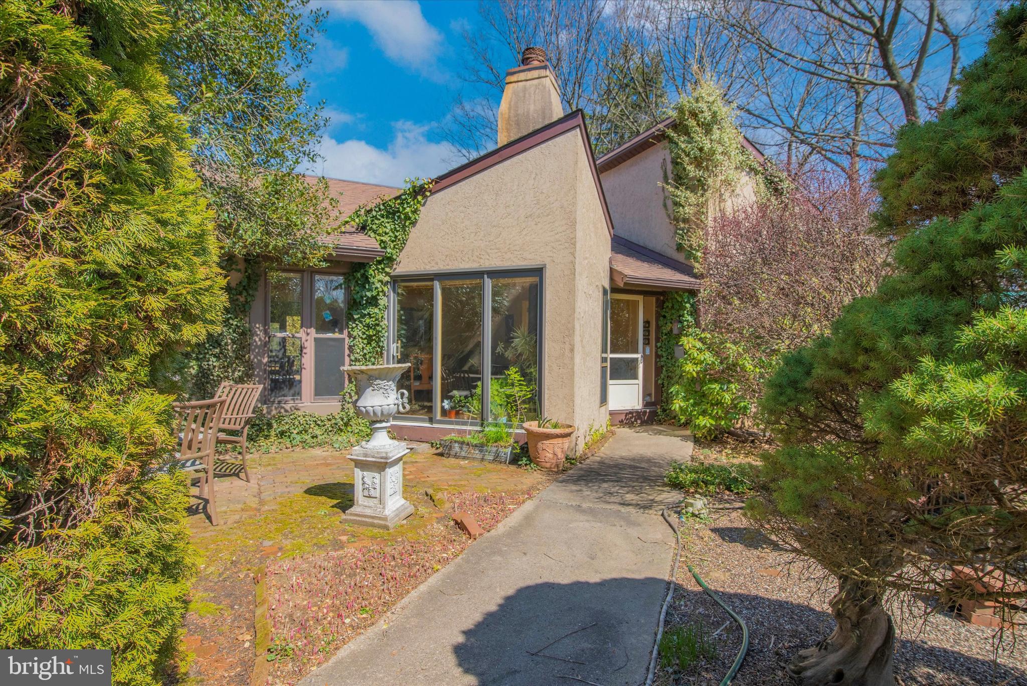 655 Lindley Road Glenside, PA 19038 - Photo 2 of 35 Front walkway showcasing sliding glass doors.