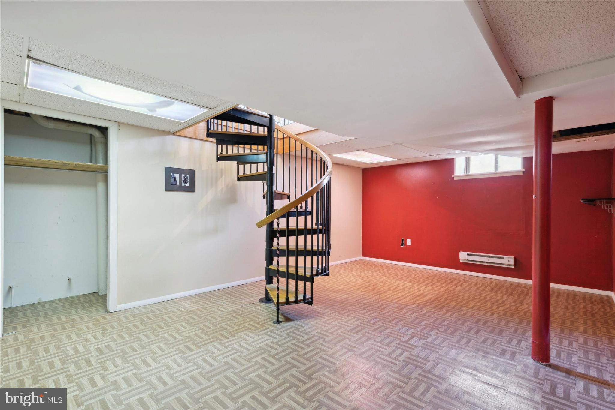 655 Lindley Road Glenside, PA 19038 - Photo 29 of 35 Spiral staircase leads to lower level.
