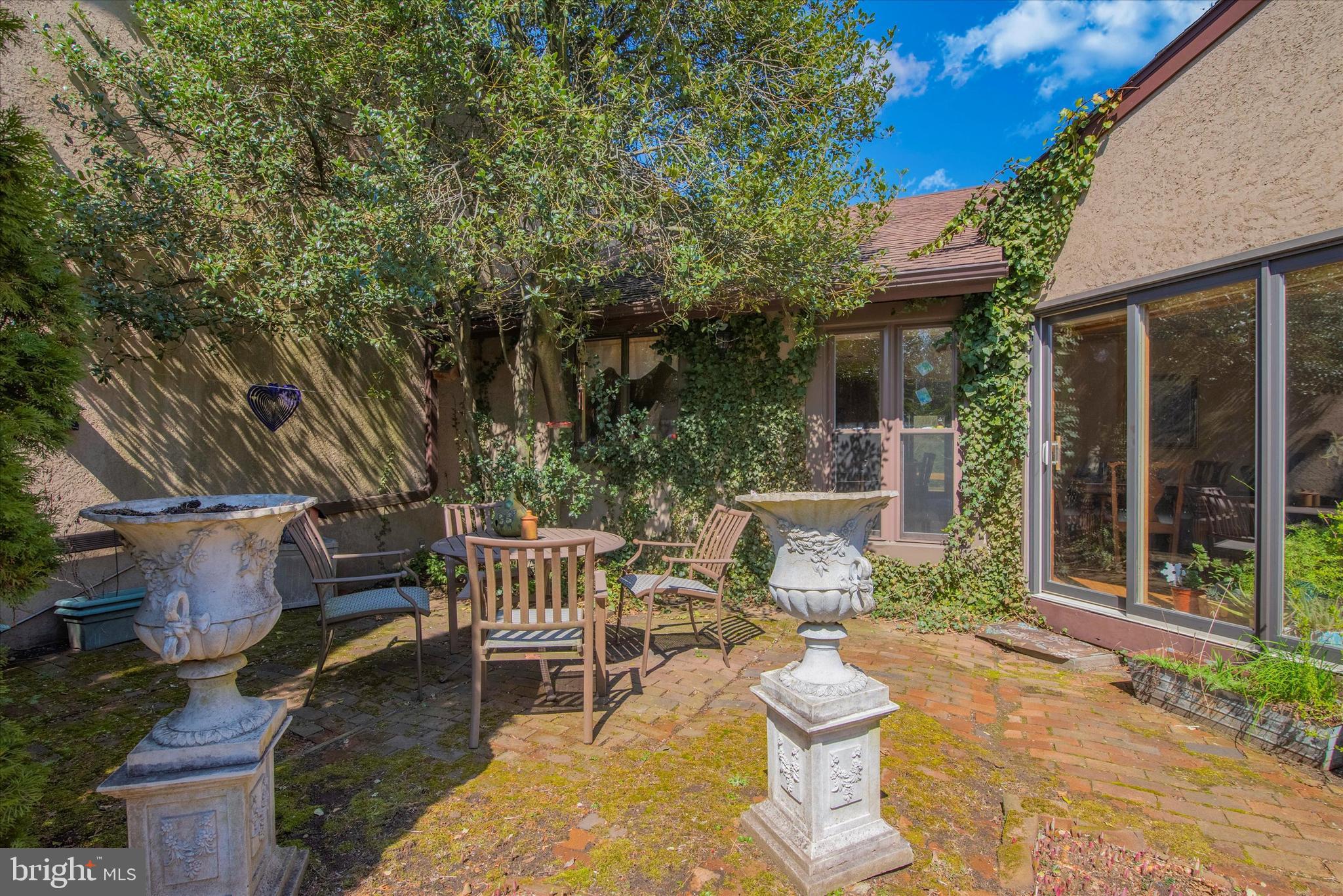 655 Lindley Road Glenside, PA 19038 - Photo 5 of 35 Quaint brick courtyard off of kitchen.