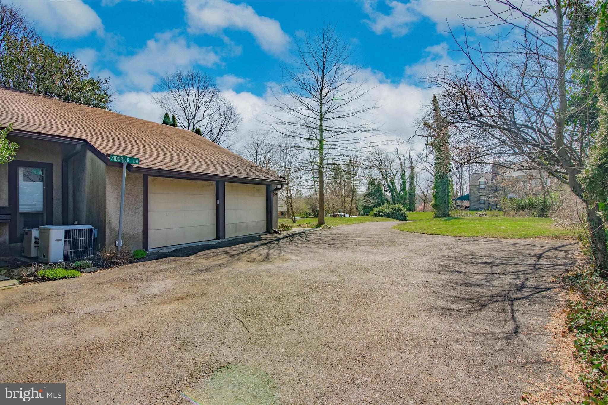 655 Lindley Road Glenside, PA 19038 - Photo 6 of 35 Two car garage , driveaway can easily fit 4 cars