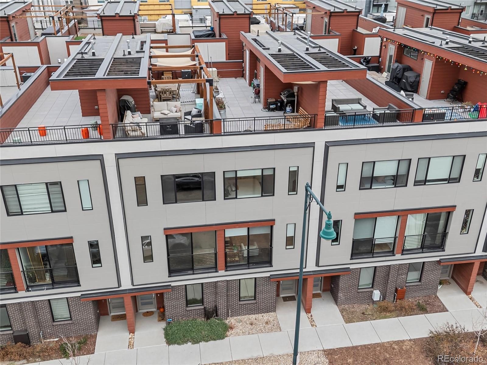 2350 Tremont Place, Unit 6 Denver, CO 80205 - Photo 38 of 40 a view of a building with a window