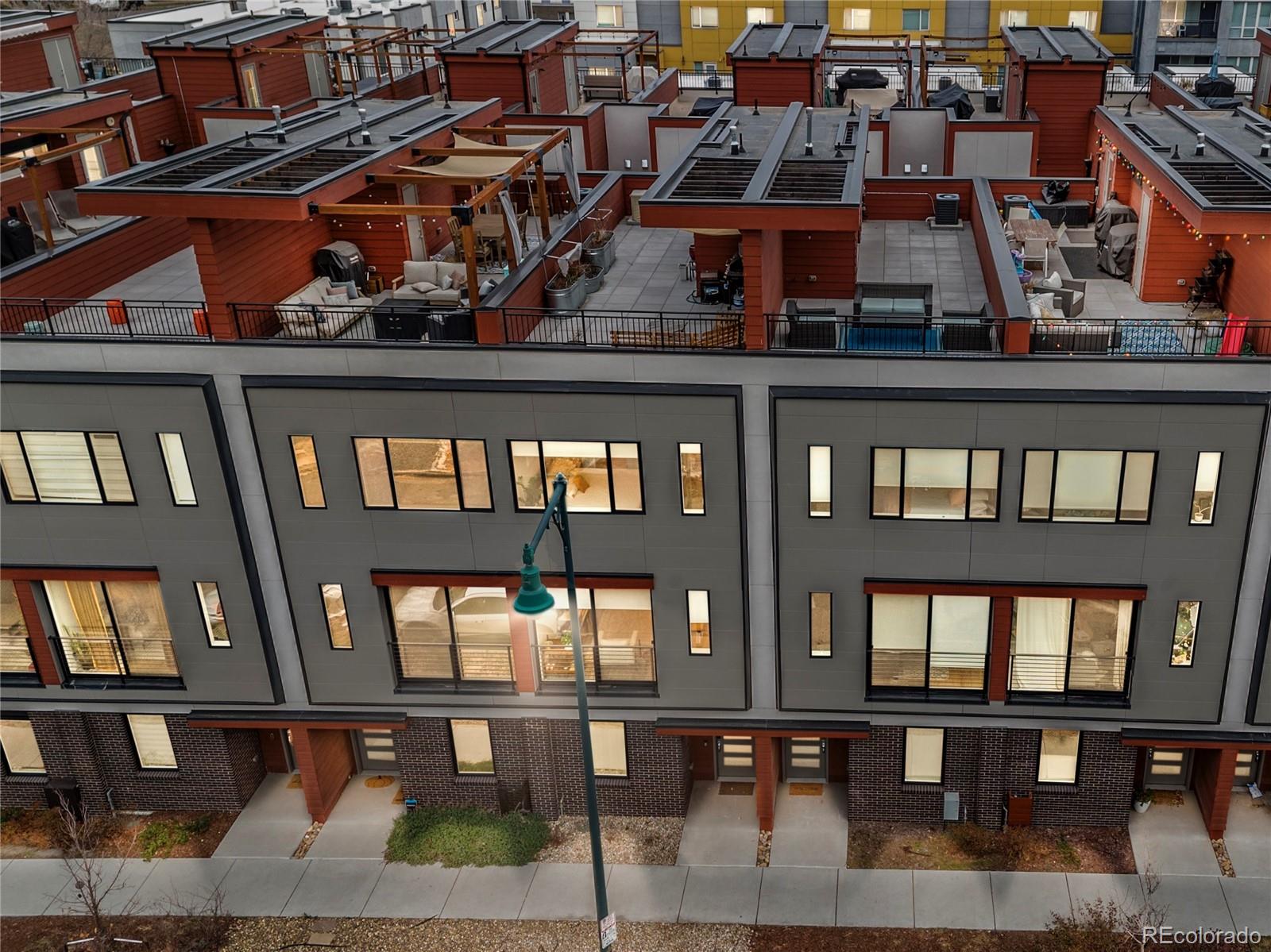 2350 Tremont Place, Unit 6 Denver, CO 80205 - Photo 6 of 40 a view of a building from a balcony