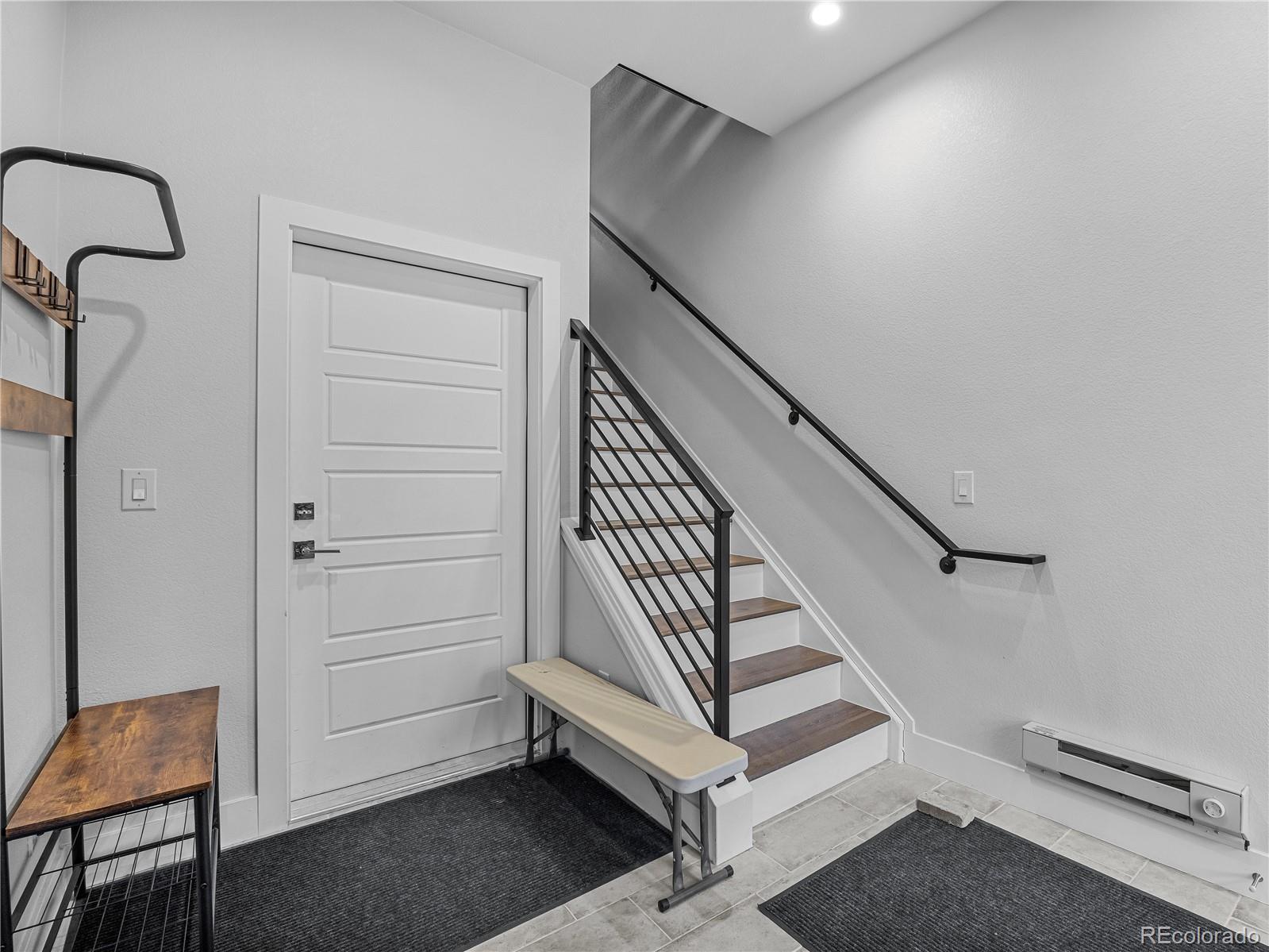 2350 Tremont Place, Unit 6 Denver, CO 80205 - Photo 9 of 40 a view of entryway and hall