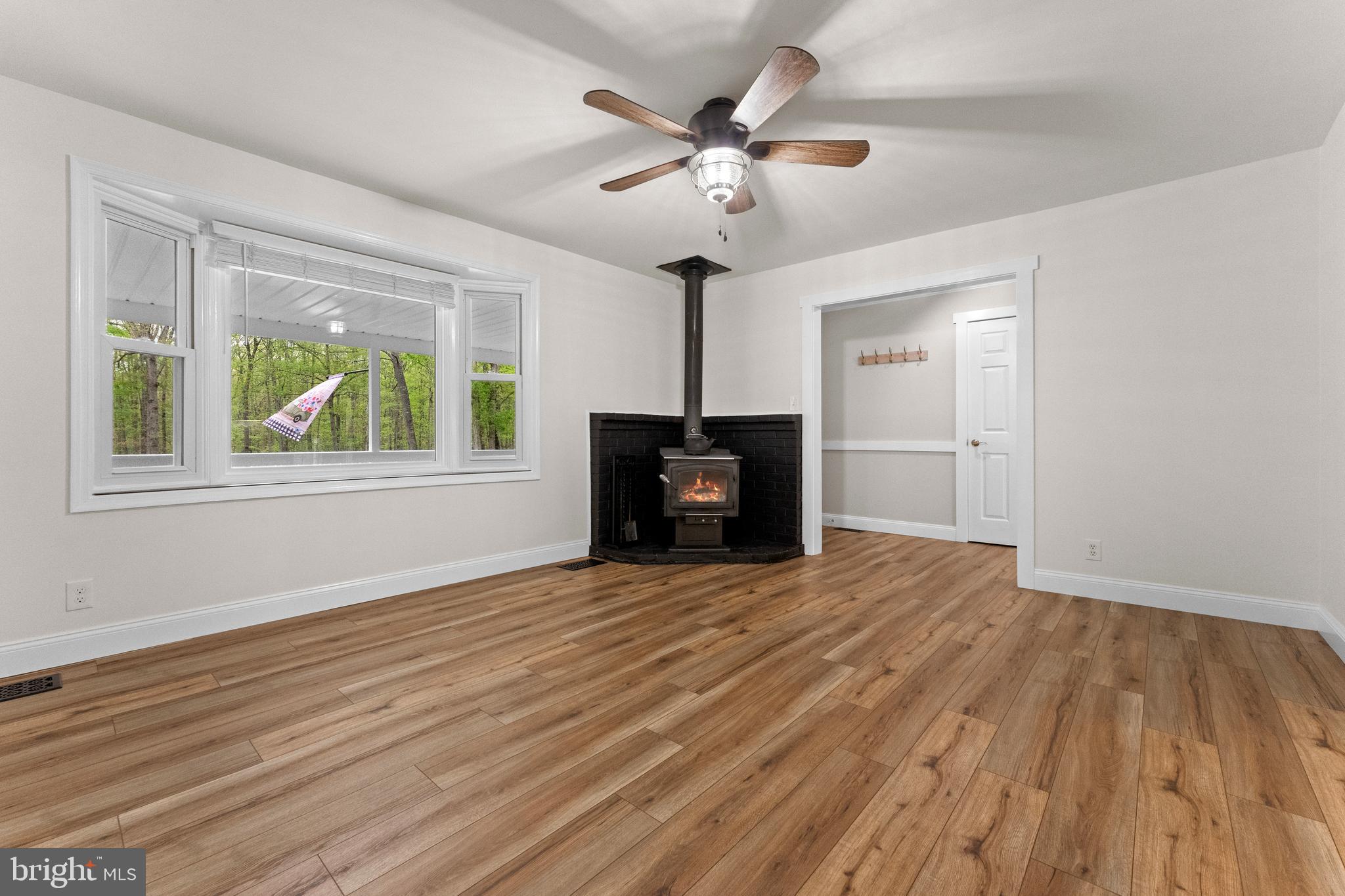 8 Colyer Road Fredericksburg, VA 22406 - Photo 14 of 56 a view of empty room with wooden floor and fan