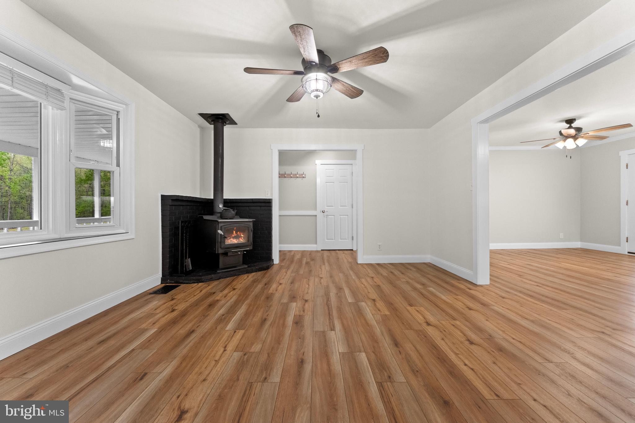 8 Colyer Road Fredericksburg, VA 22406 - Photo 16 of 56 a view of empty room with wooden floor and fan