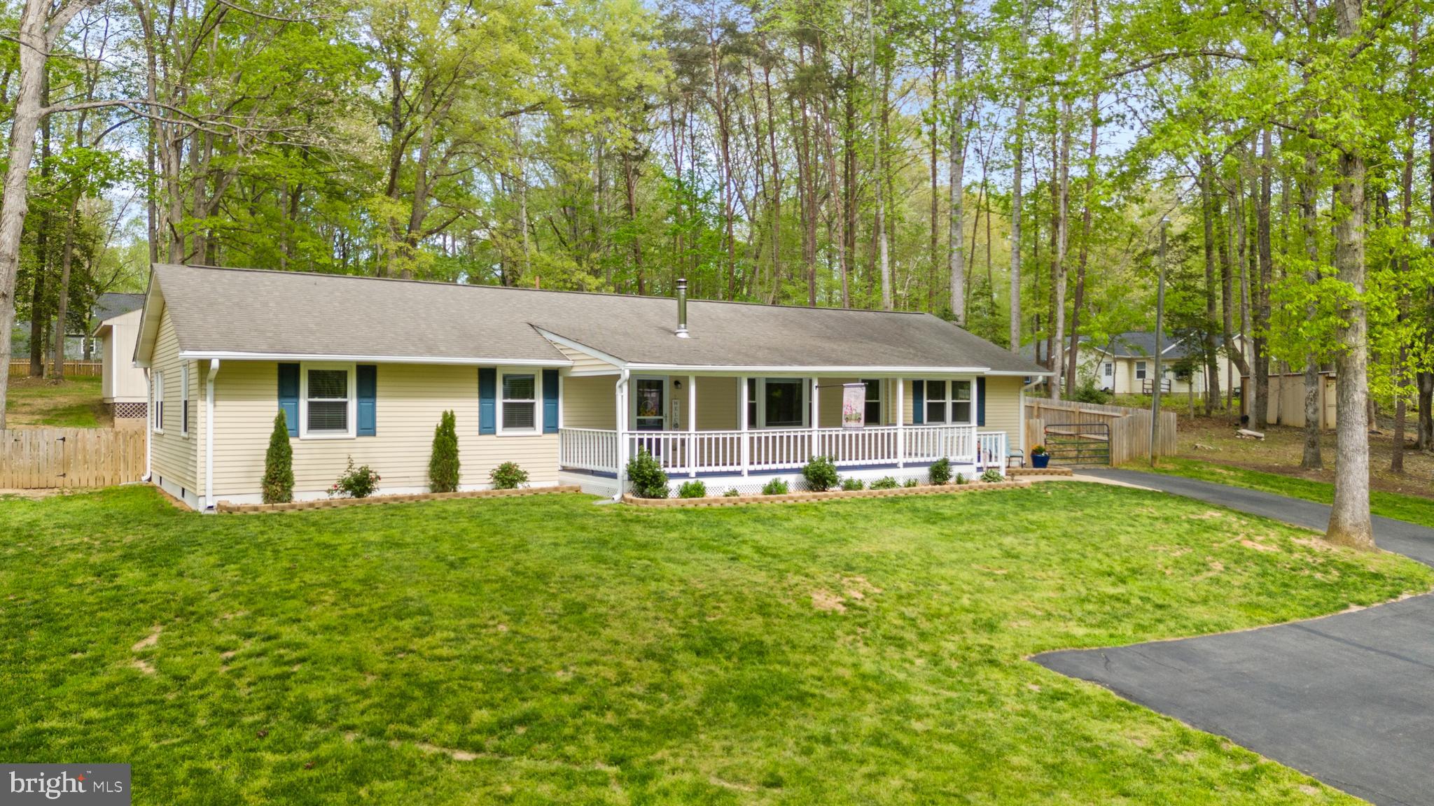 8 Colyer Road Fredericksburg, VA 22406 - Photo 2 of 56 a front view of a house with yard patio and green space
