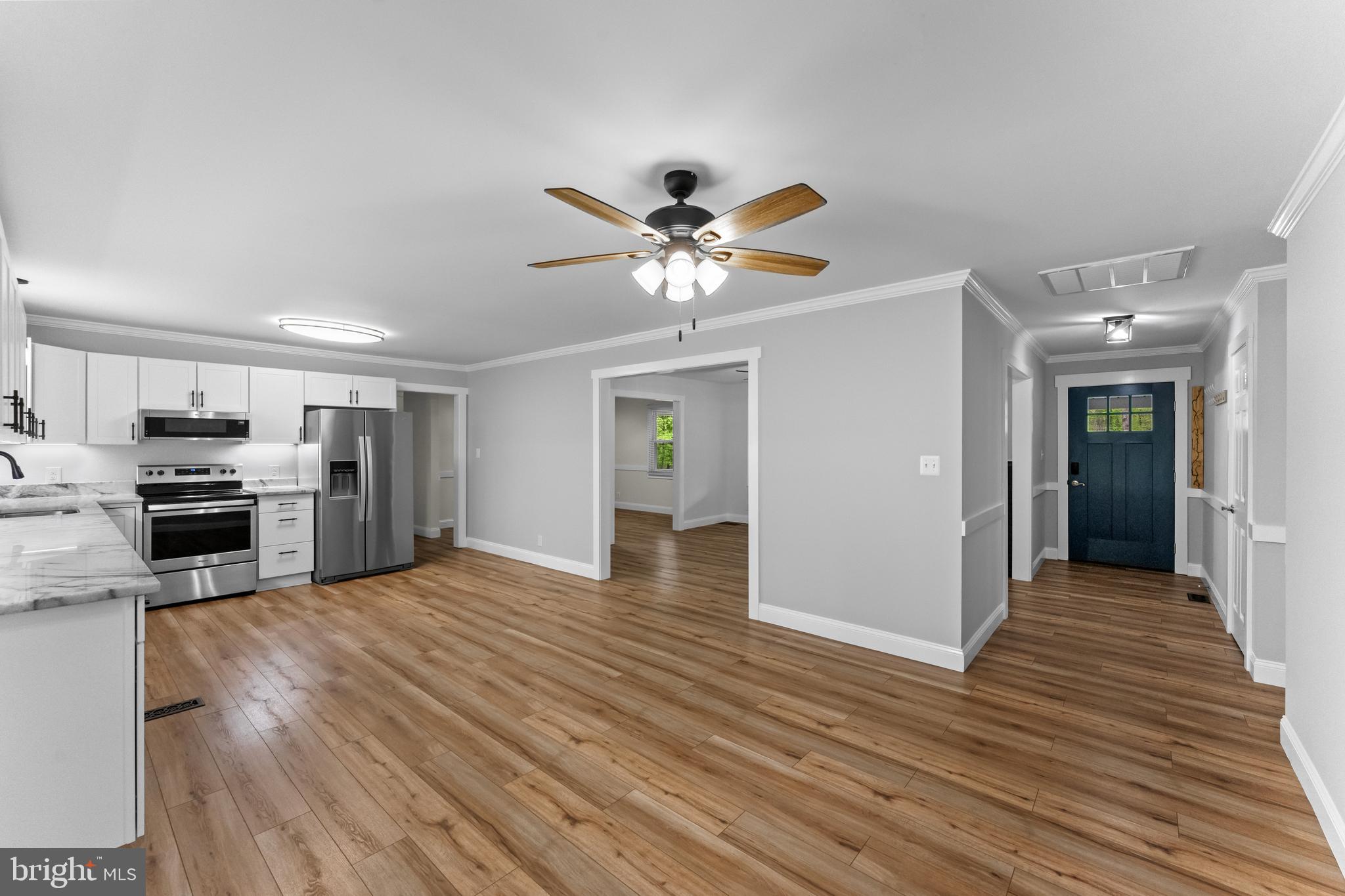 8 Colyer Road Fredericksburg, VA 22406 - Photo 21 of 56 a view of an empty room with kitchen and a window