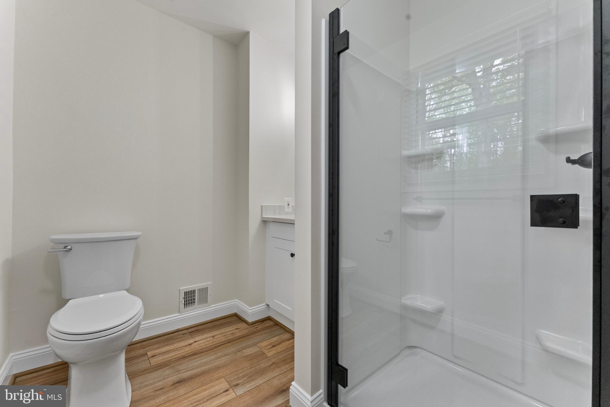 8 Colyer Road Fredericksburg, VA 22406 - Photo 29 of 56 a bathroom with a toilet and a shower