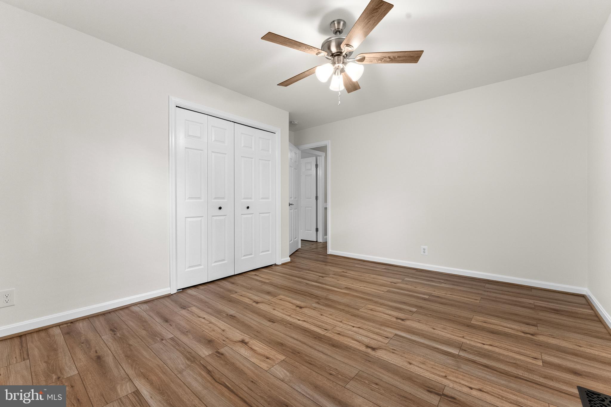 8 Colyer Road Fredericksburg, VA 22406 - Photo 33 of 56 a view of an empty room with wooden floor