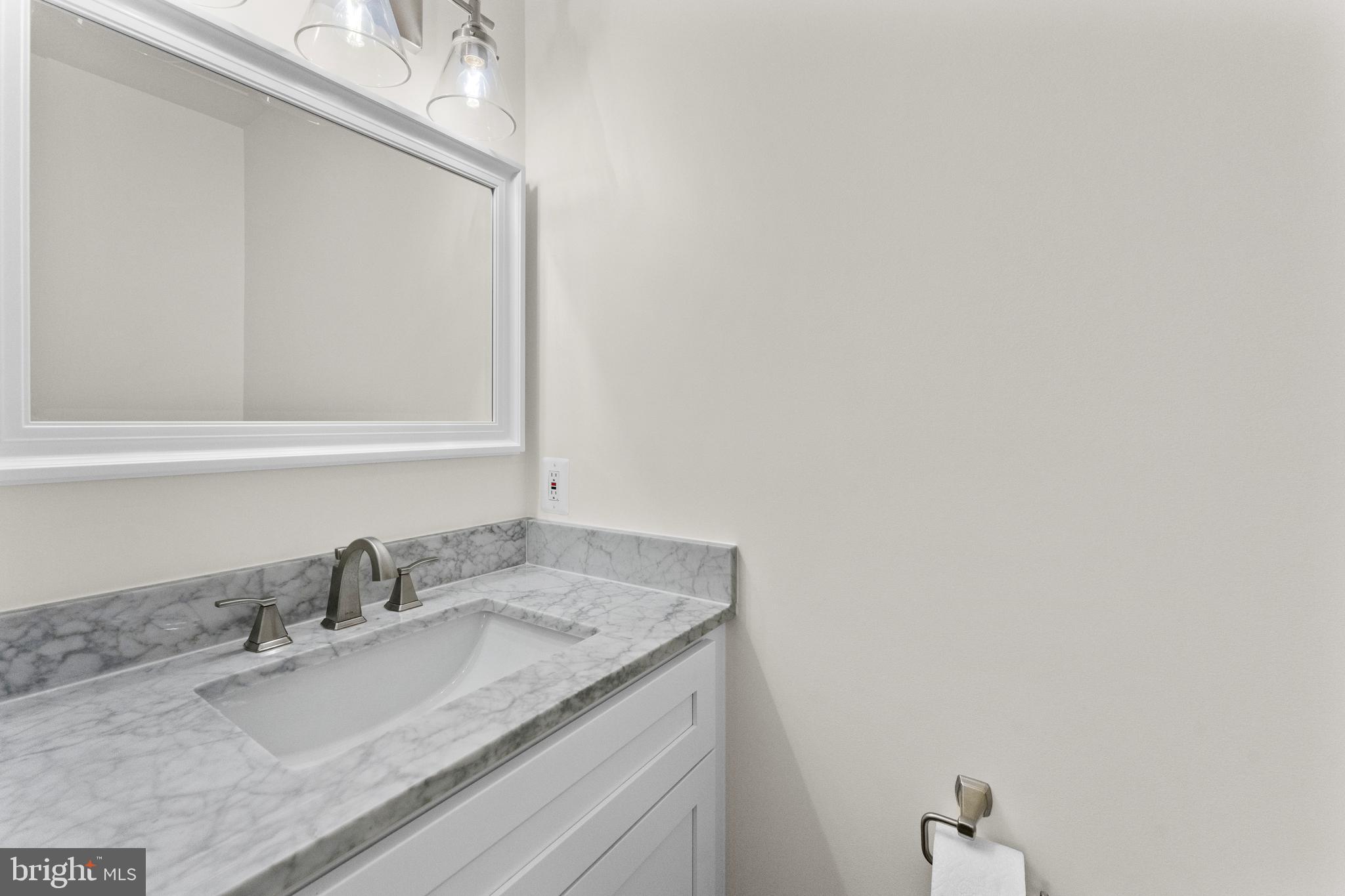 8 Colyer Road Fredericksburg, VA 22406 - Photo 36 of 56 a bathroom with a granite countertop sink and a mirror