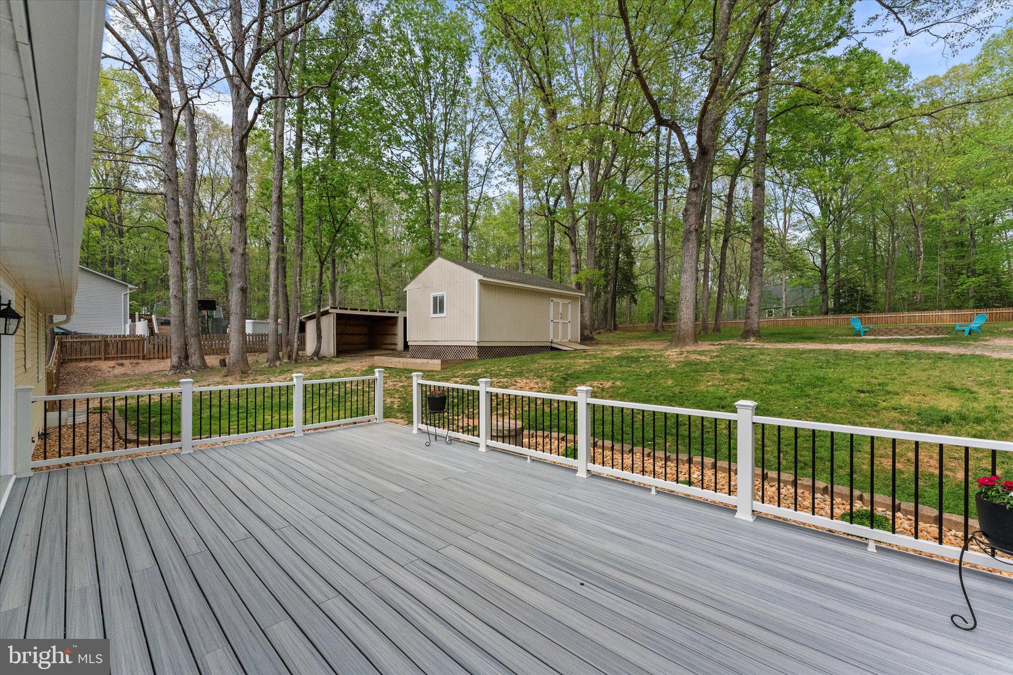 8 Colyer Road Fredericksburg, VA 22406 - Photo 46 of 56 a view of house with deck and outdoor space