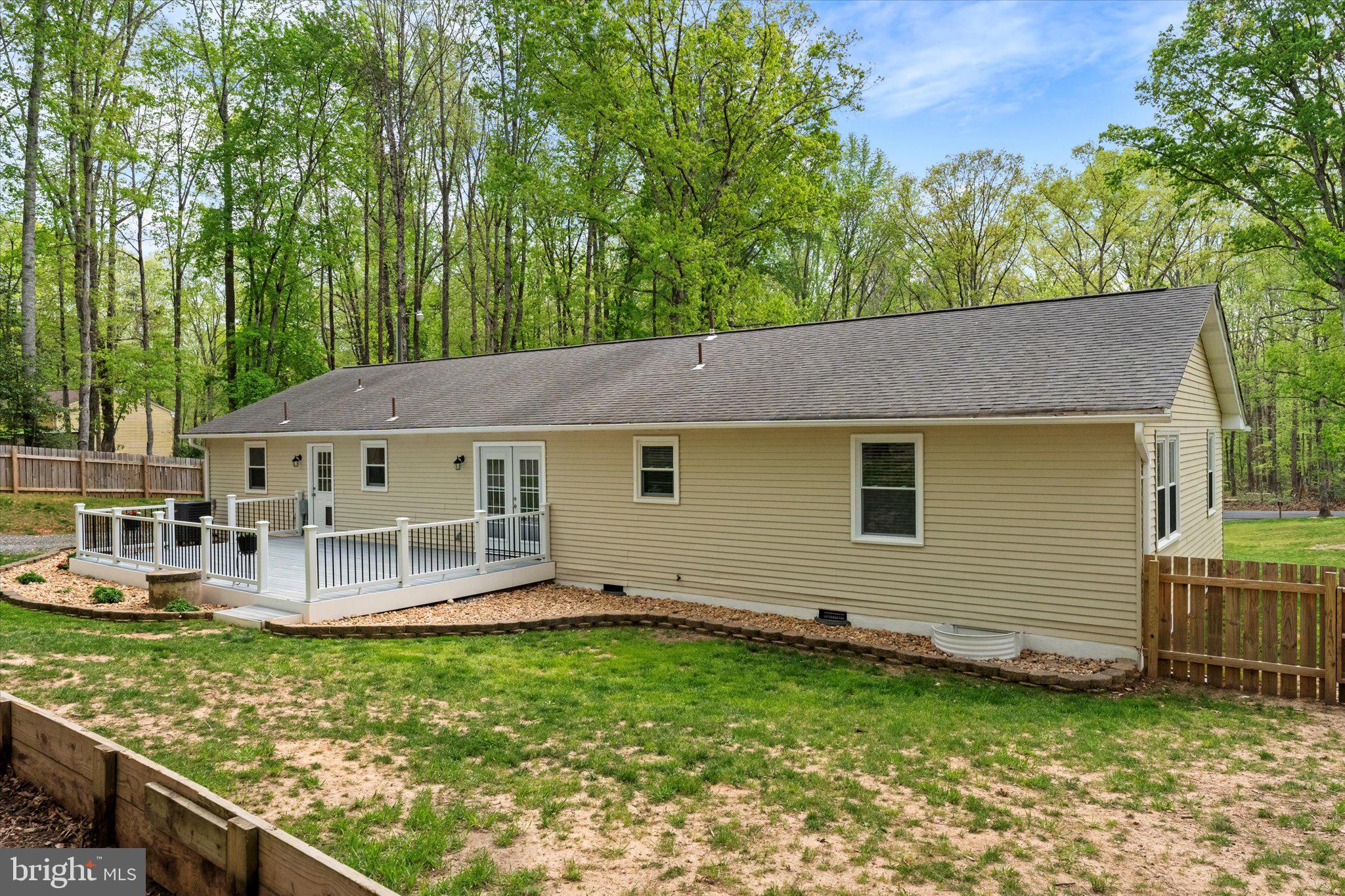 8 Colyer Road Fredericksburg, VA 22406 - Photo 50 of 56 a view of a house with a yard and sitting area