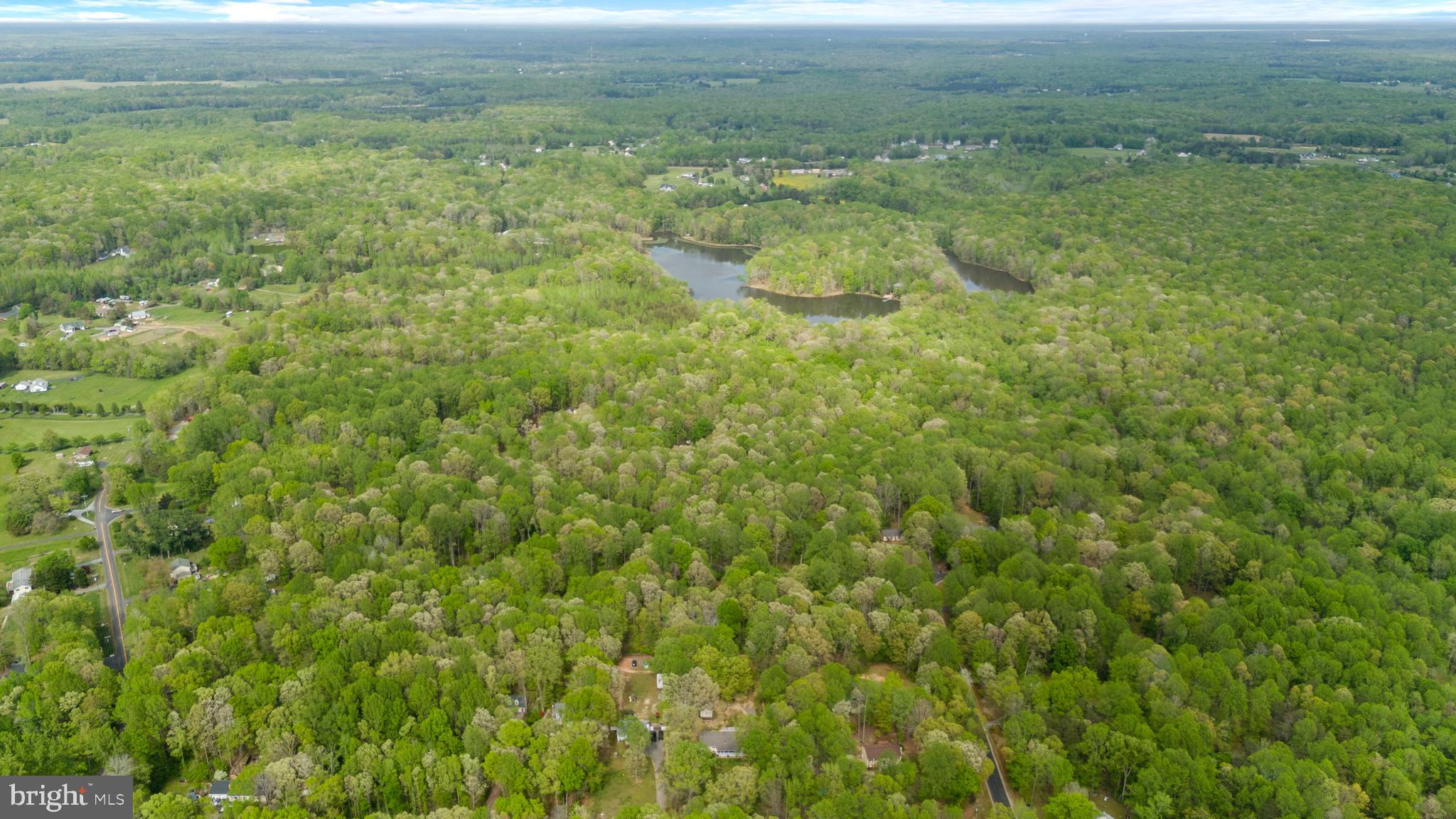 8 Colyer Road Fredericksburg, VA 22406 - Photo 55 of 56 a view of a field of grass and trees