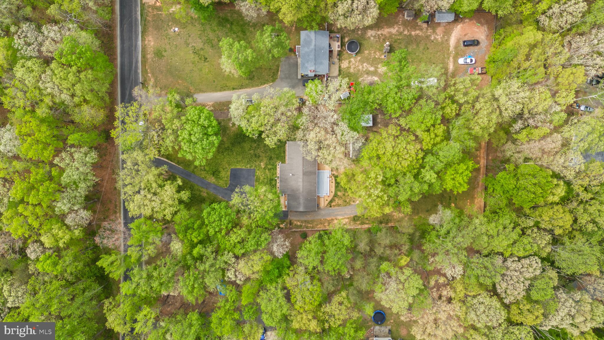 8 Colyer Road Fredericksburg, VA 22406 - Photo 8 of 56 a backyard of a building with lots of green space