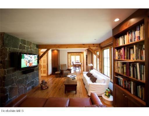 26 S Road Heath, MA 01346 - Photo 13 of 29 a living room with lots of furniture and a flat screen tv