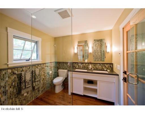 26 S Road Heath, MA 01346 - Photo 20 of 29 a bathroom with a sink a toilet and mirror