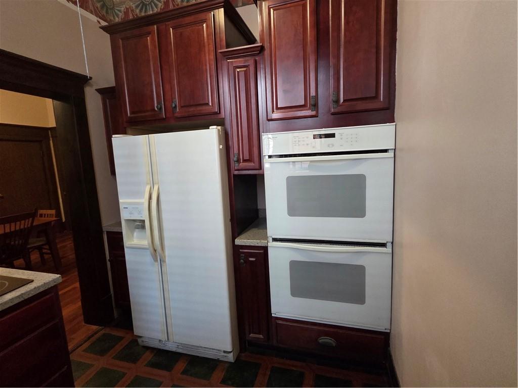 701 4th Street, Unit 2 Pittsburgh, PA 15215 - Photo 13 of 24 a kitchen with a refrigerator sink and cabinets