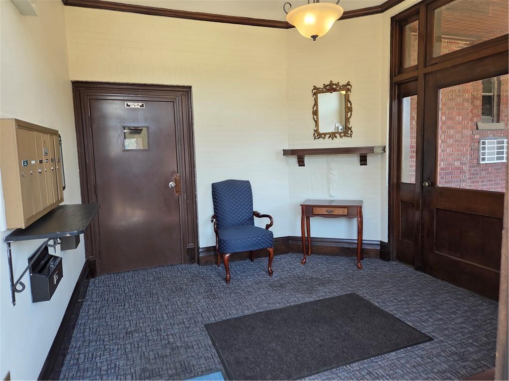 701 4th Street, Unit 2 Pittsburgh, PA 15215 - Photo 4 of 24 a living room with furniture and a piano