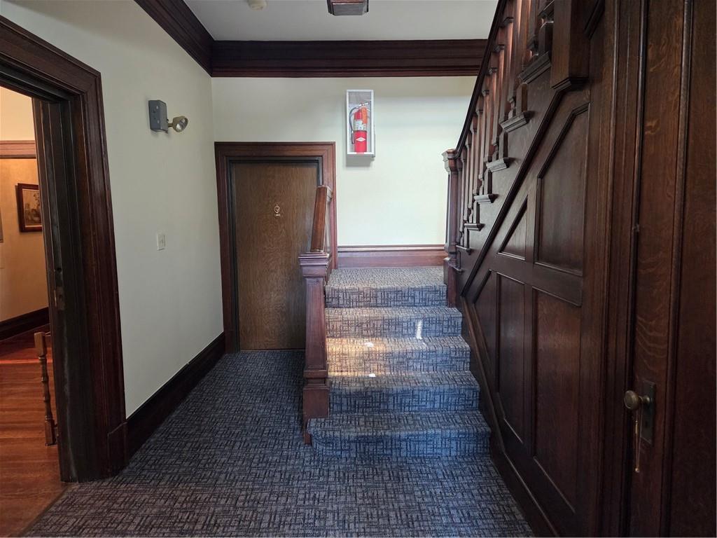 701 4th Street, Unit 2 Pittsburgh, PA 15215 - Photo 5 of 24 a view of a hallway with wooden floor and staircase