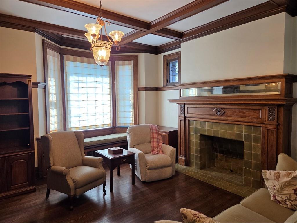 701 4th Street, Unit 2 Pittsburgh, PA 15215 - Photo 7 of 24 a living room with furniture and a fireplace