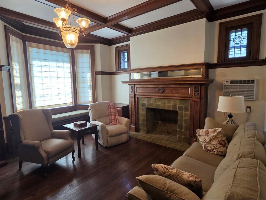 701 4th Street, Unit 2 Pittsburgh, PA 15215 - Photo 9 of 24 a living room with furniture and a fireplace