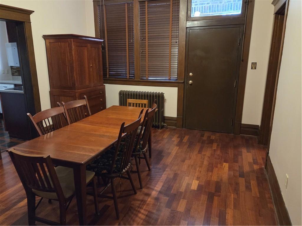 701 4th Street, Unit 2 Pittsburgh, PA 15215 - Photo 10 of 24 a view of a dining room with furniture and wooden floor