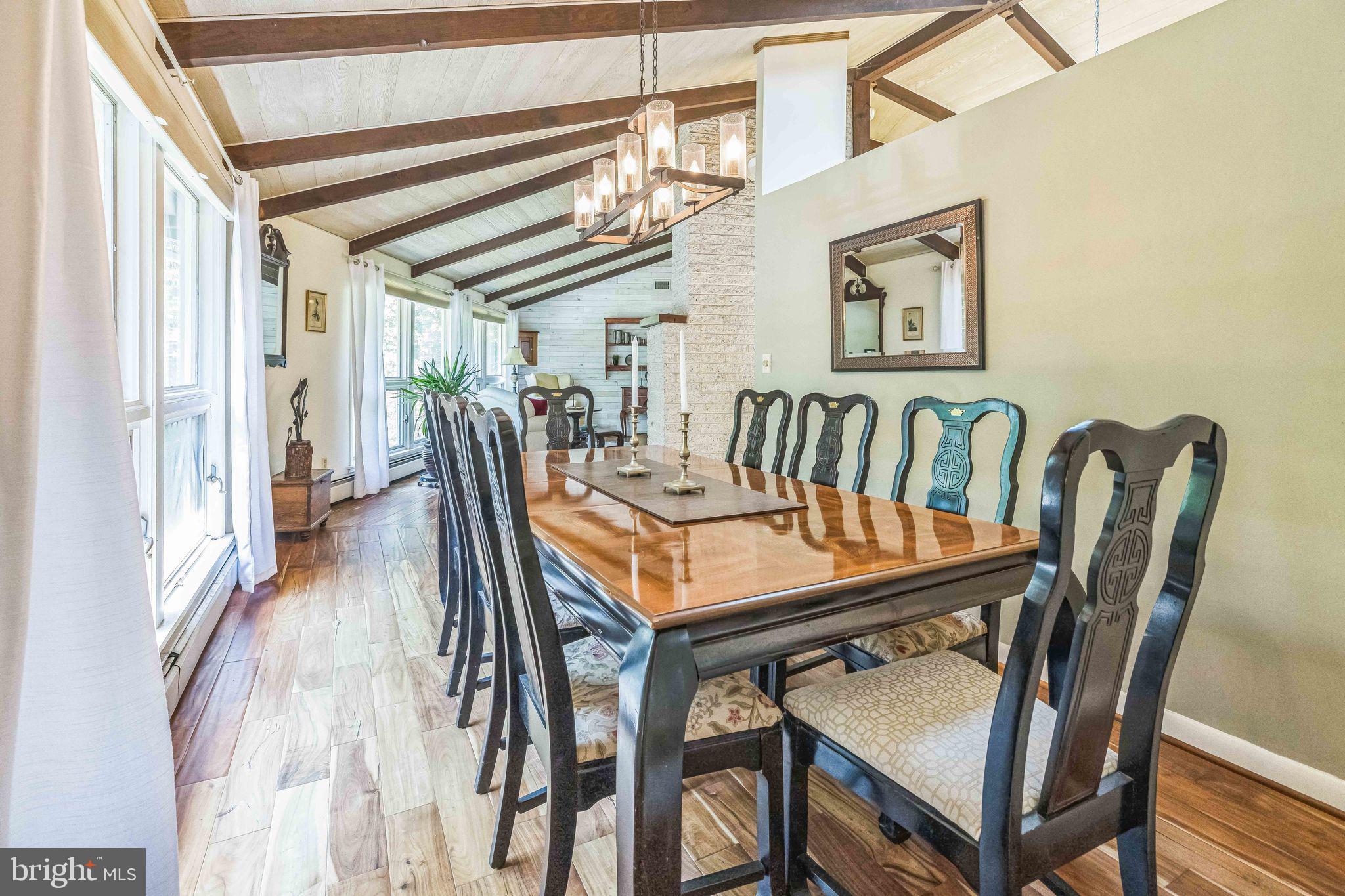 712 Ridge Road Telford, PA 18969 - Photo 9 of 32 a dining room with furniture and wooden floor