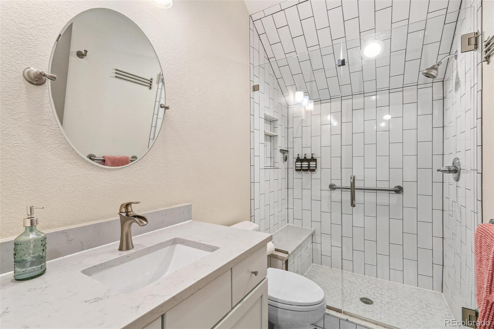 3885 Wolff Street Denver, CO 80212 - Photo 40 of 50 a bathroom with a sink toilet and shower
