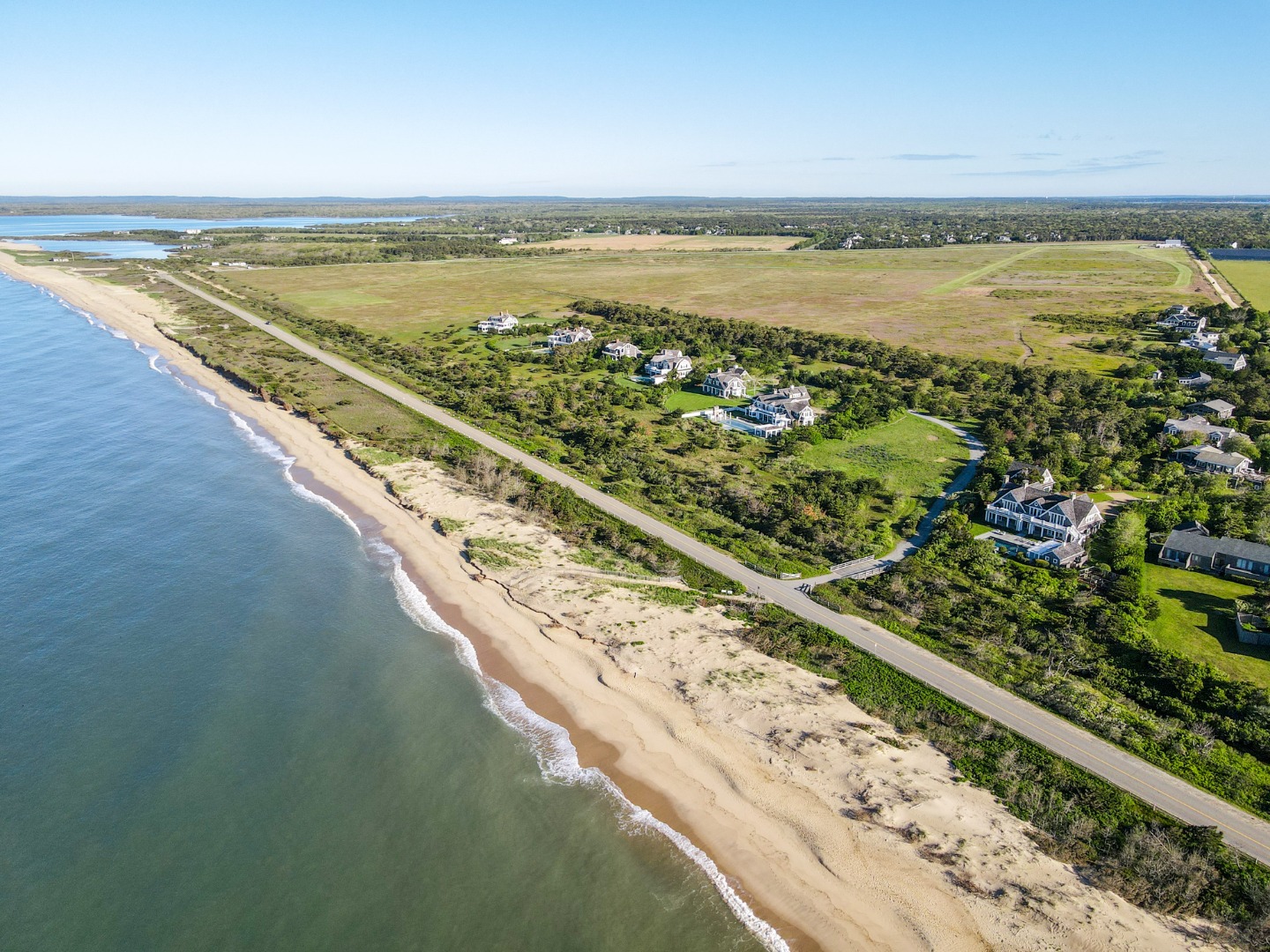 5 Atlantic Drive Edgartown, MA 02539 - Photo 4 of 13 a view of an ocean from a balcony