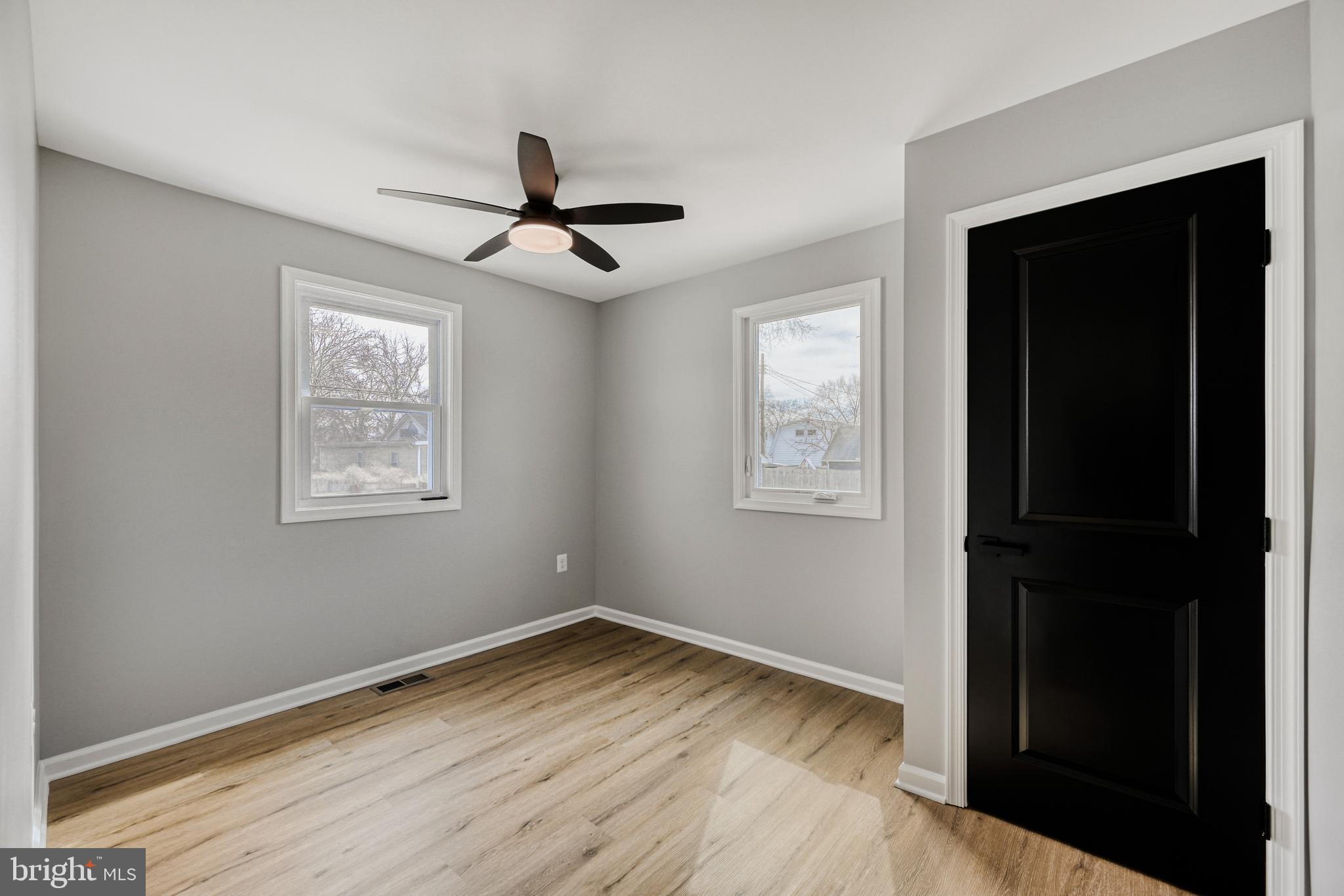 39 Transverse Avenue Middle River, MD 21220 - Photo 11 of 29 a view of empty room with wooden floor and fan
