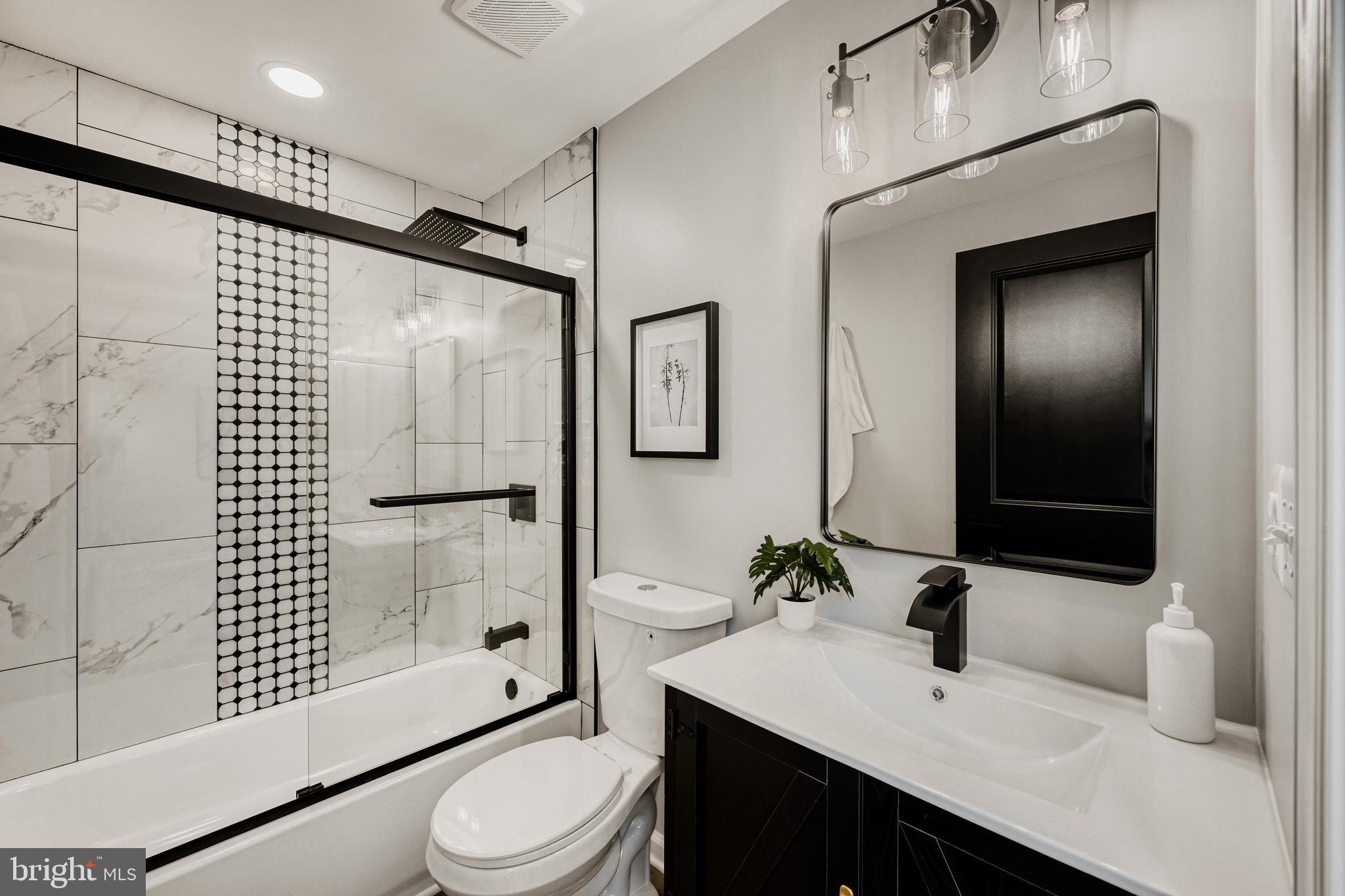 39 Transverse Avenue Middle River, MD 21220 - Photo 12 of 29 a bathroom with a sink toilet tub and shower