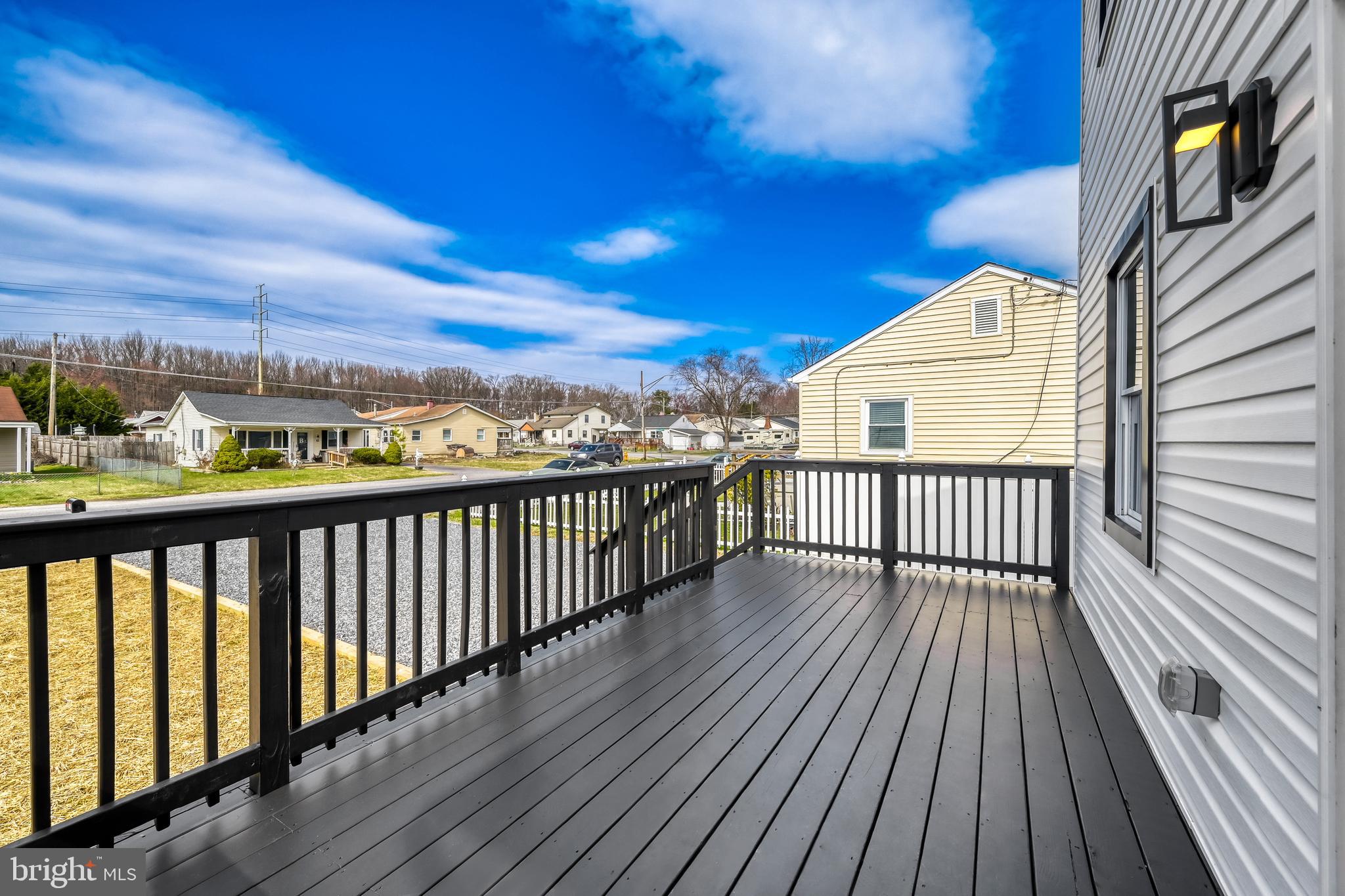 39 Transverse Avenue Middle River, MD 21220 - Photo 3 of 29 a view of balcony with wooden floor
