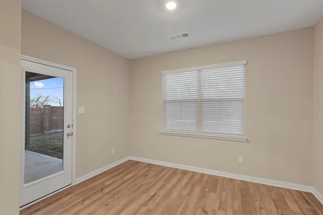 an empty room with window