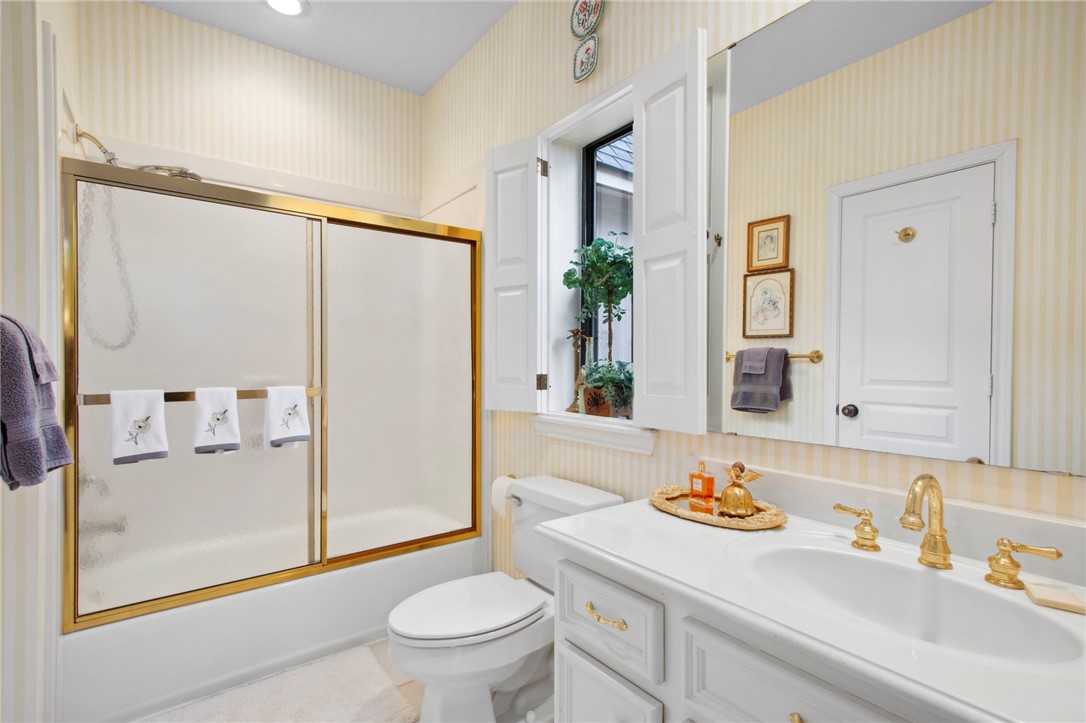 322 Whispering Meadow Magnolia, TX 77355 - Photo 20 of 34 a bathroom with a sink toilet and shower