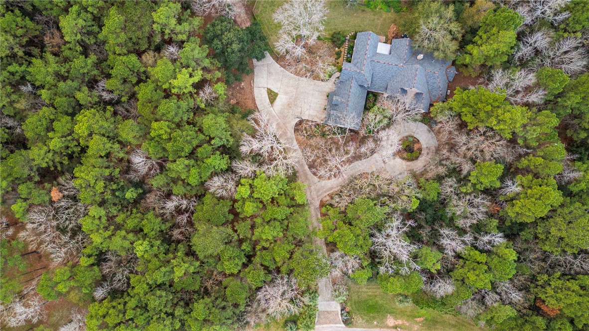 322 Whispering Meadow Magnolia, TX 77355 - Photo 33 of 34 an aerial view of a house with a yard and garden