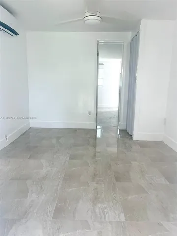 an empty room with window