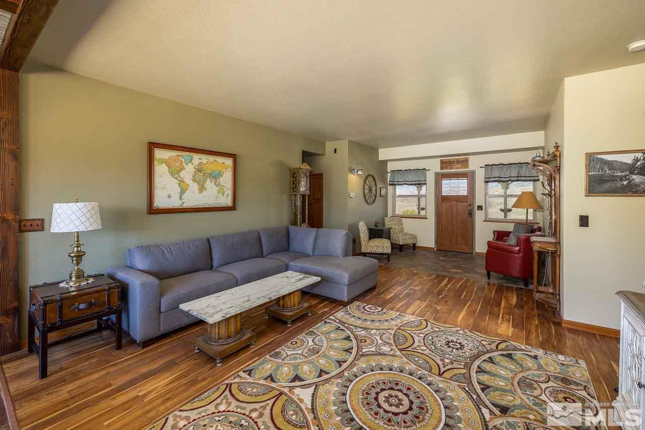 3415 Basque Oven Road Reno, NV 89510 - Photo 17 of 32 a living room with furniture and a lamp