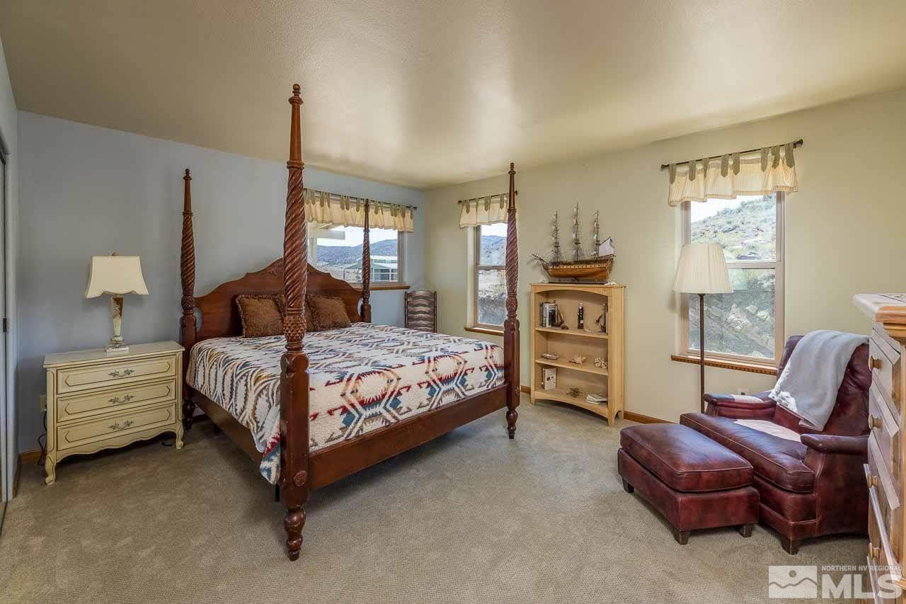 3415 Basque Oven Road Reno, NV 89510 - Photo 24 of 32 a bedroom with a bed and furniture