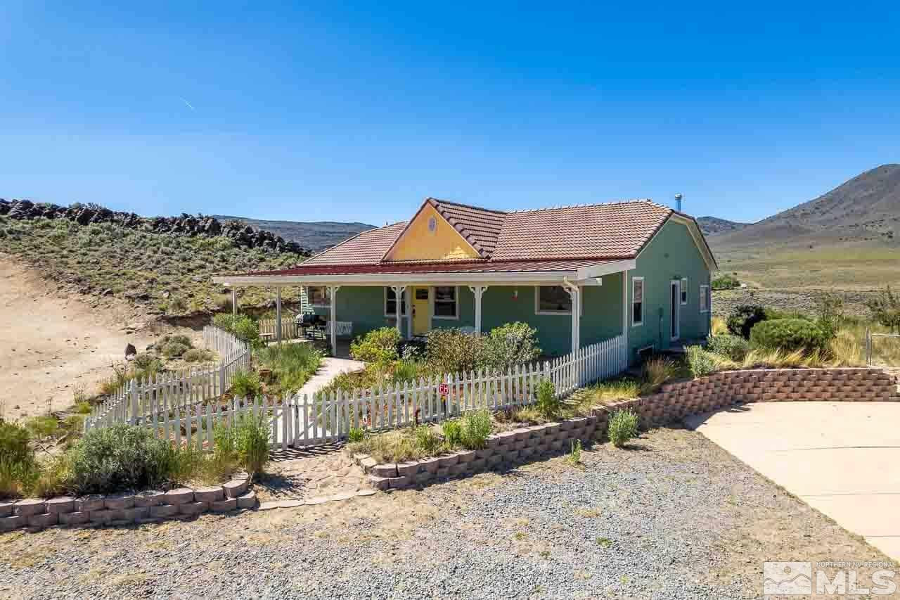 3415 Basque Oven Road Reno, NV 89510 - Photo 4 of 32 a front view of house with a garden